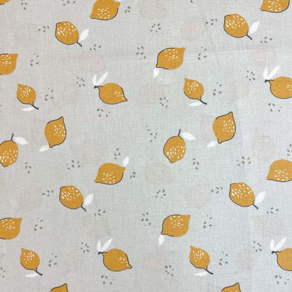Tissu premium 100 % coton - citrons sur fond gris clair 115 g/m²