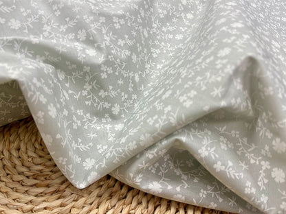 Tissu premium 100 % coton - motif floral délicat sur fond gris 110 g/m²