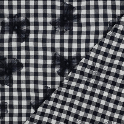 Image du tissu Premium 100 % coton - noir et blanc avec nœuds en tulle 166 g/m² – disponible chez Šarlotes audumi