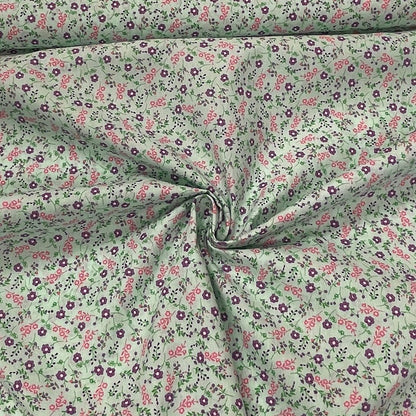Tissu premium 100 % coton, motif fleuri sur fond bleu 115 g/m²