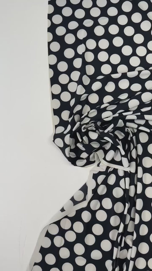 Pēdējais gabaliņš- Italian knitted fabric with dot pattern | Polyamide 51% Viscose 41% Elastane 8% | 132 cm- 70cm