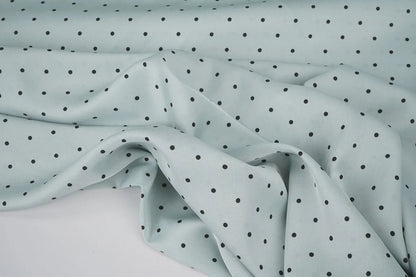 Satin with elastane - dots on a mint background 90 g/m²