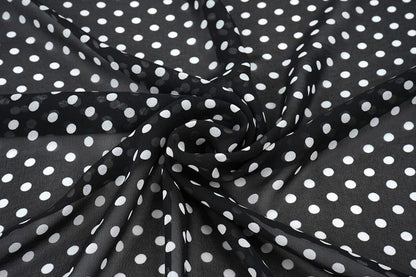Chiffon à pois blancs sur fond noir | 150 cm | 65 g/m²