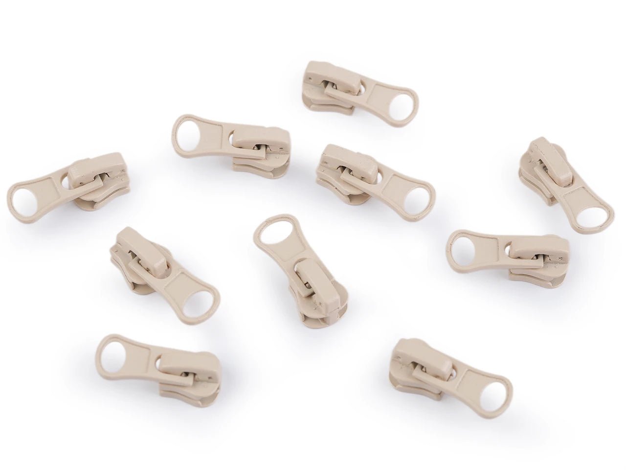 Attēls ar Slīdnis, kugītis plastmasas rāvējslēdzējam Nr.3|dažādu toņu – pieejams Šarlotes audumi