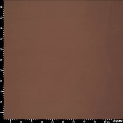 Image en tissu softshell avec élasthanne - ton chocolat 300 g/m² – disponible chez Charlotte Tissus