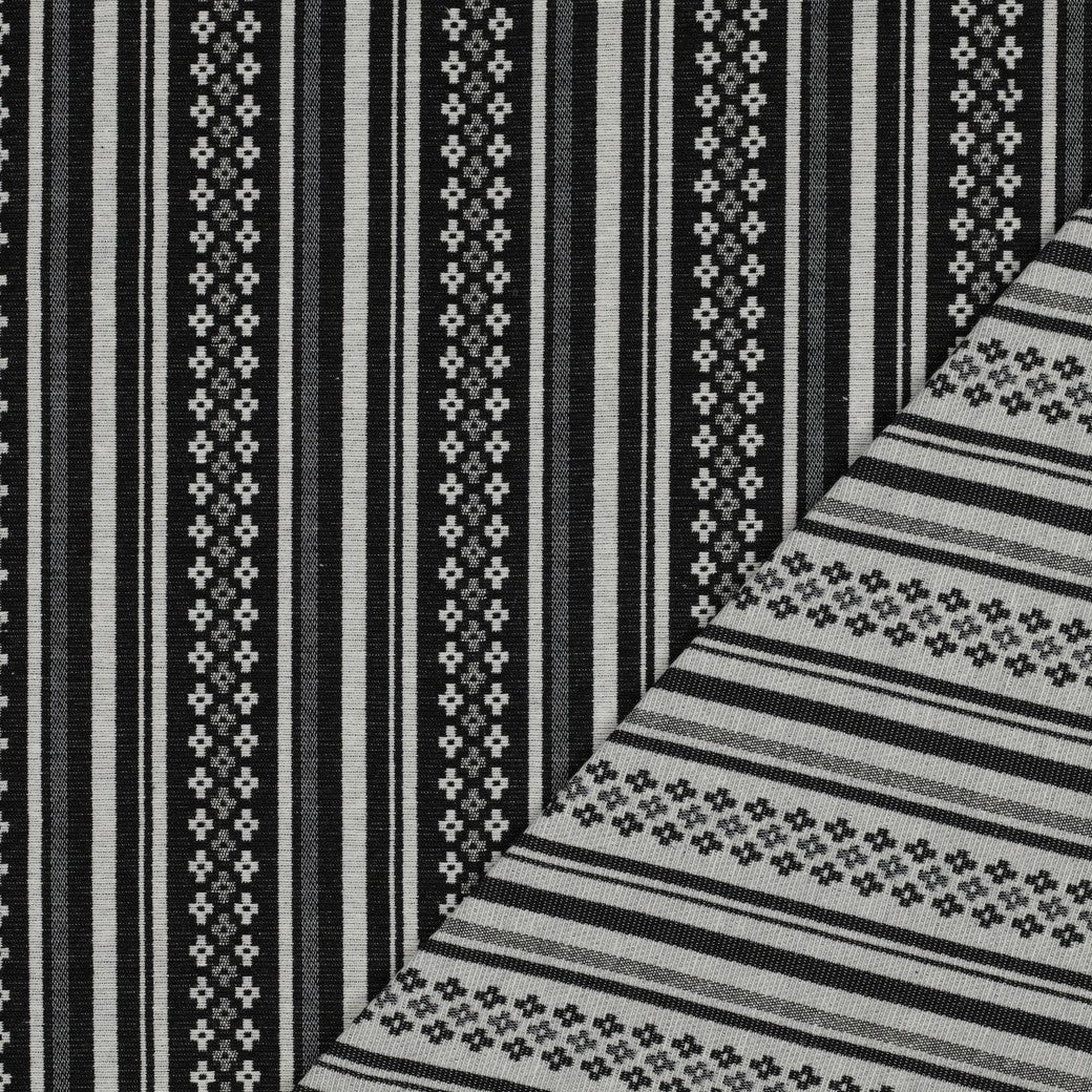 Attēls ar Tautiska raksta audums - melnbalts abstrakts raksts 315 g/m² – pieejams Šarlotes audumi