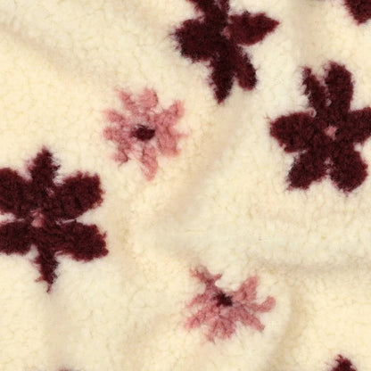 Teddy-Fleece-Blumen auf hellem Hintergrund