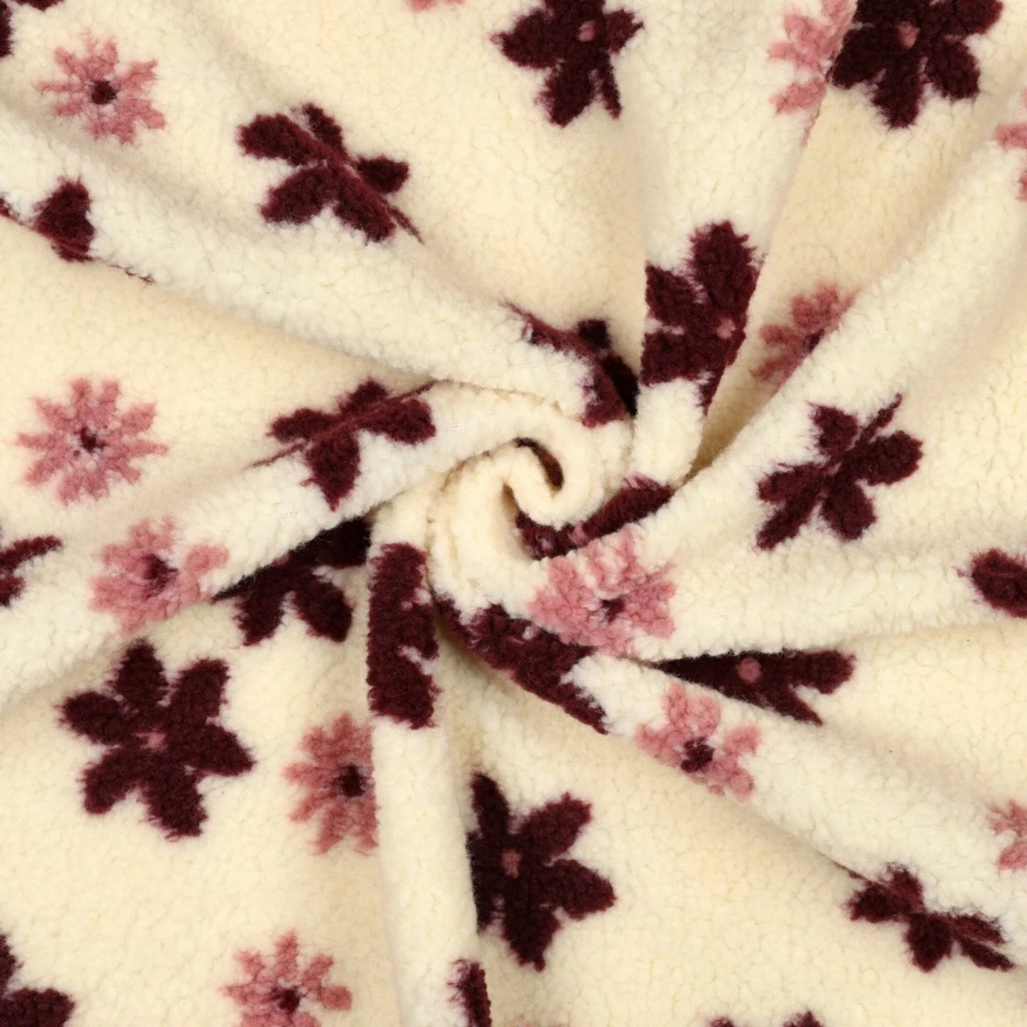 Teddy-Fleece-Blumen auf hellem Hintergrund