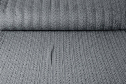 Image of knitted fabric with knit pattern - gray braids 340 g/m² – available at Šarlotes audumi