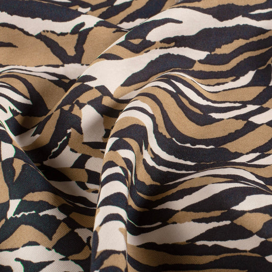 Attēls ar Viskozes audums - brūns zebras motīvs 125 g/m² – pieejams Šarlotes audumi