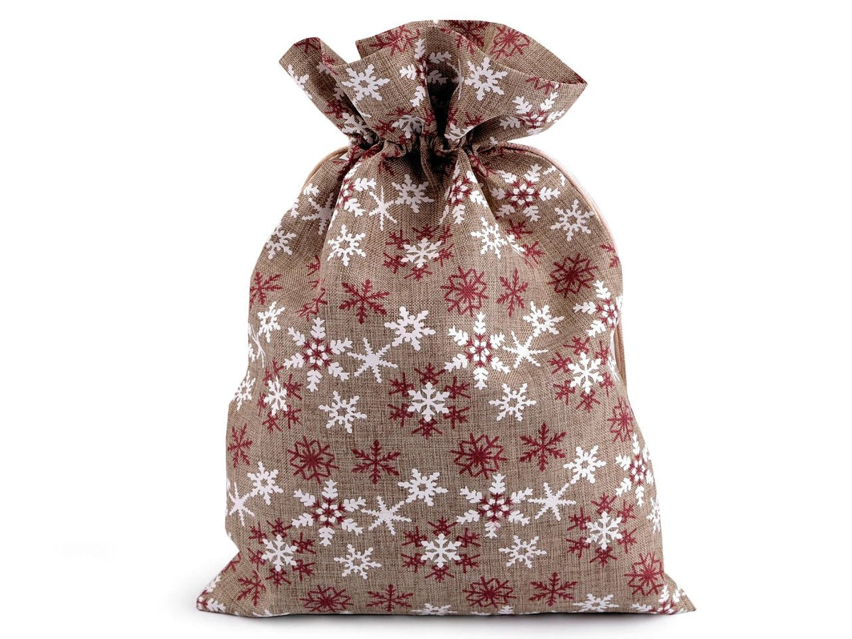 Bild eines Weihnachtsgeschenksacks mit Schneeflocken 20 × 30 cm – online erhältlich bei Šarlotes audumi