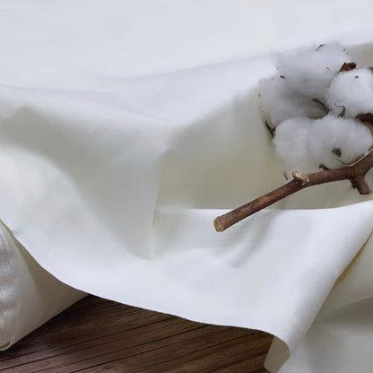 Tissu 100 % coton, blanc lait 125 g/m²