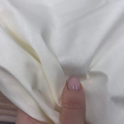 Tissu 100 % coton blanc lait 125 g/m²