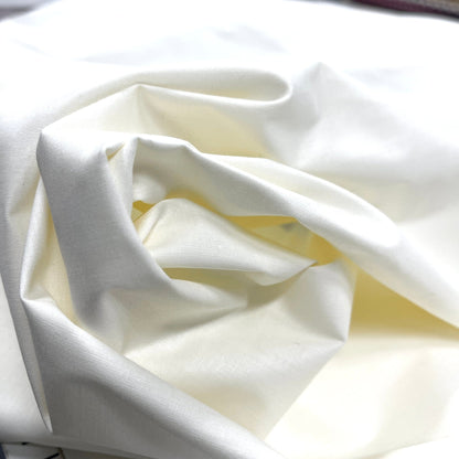 Tissu 100 % coton blanc lait 125 g/m²