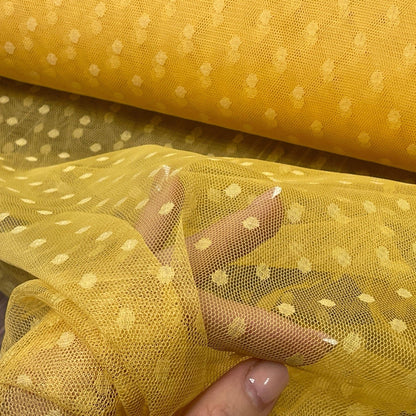 Tulle jaune à pois