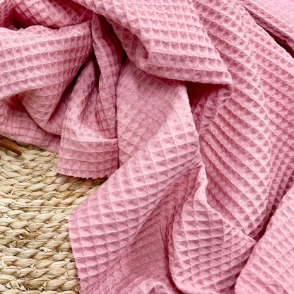 Tissu gaufré rose 230 g/m²